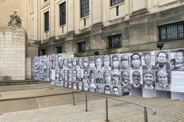 The Inside Out Project outside of the Brooklyn Museum, showing b&w portraits of healthcare workers